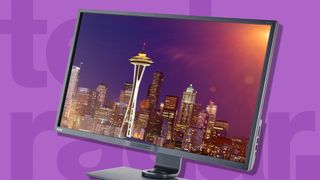 One of TechRadar's best monitor picks displaying a photo of a city