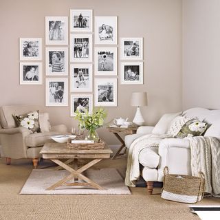 A photo gallery in a living room with lots of natural accents