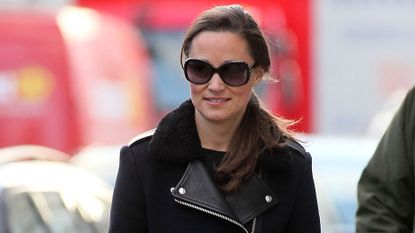 Pippa Middleton smiles as she walks in London wearing an aviator jacket and sunglasses in 2012