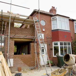 Building project of a two storey extension to a brick house