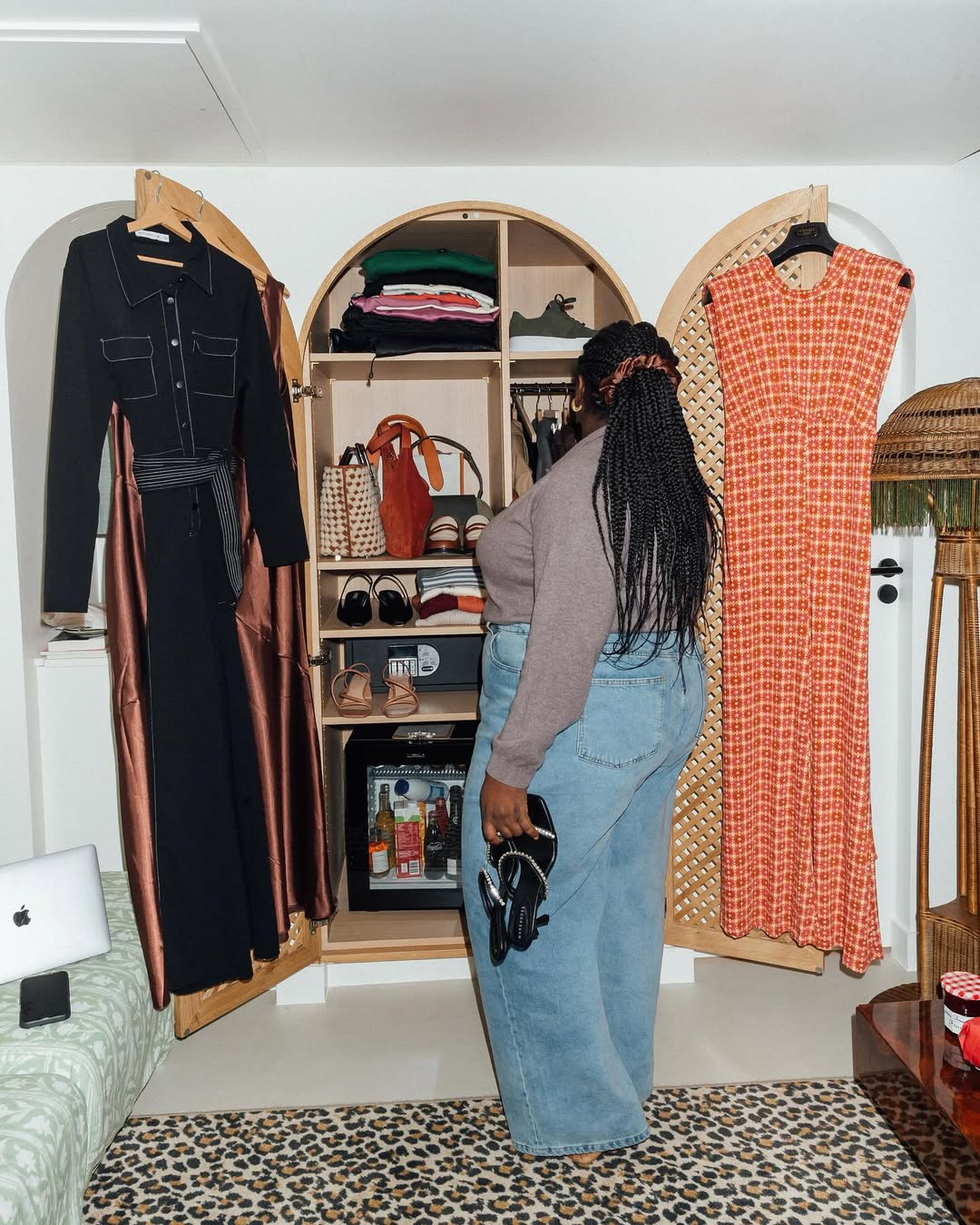 Abisola standing in front of a closet