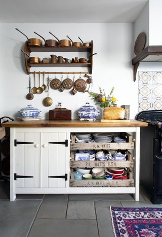 Kitchen with shelves made from vintage trays