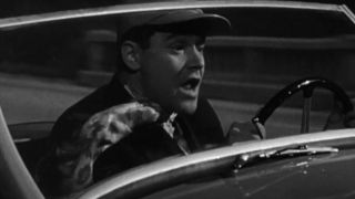 Jack Lemmon driving a car in Phffft