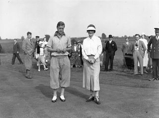 June 1933 The Prince of Wales, later King Edward VIII, with Lady Astor, after he had beaten her in the semi-finals of the Parliamentary Golf Handicap, at Walton Heath. GettyImages-3299875