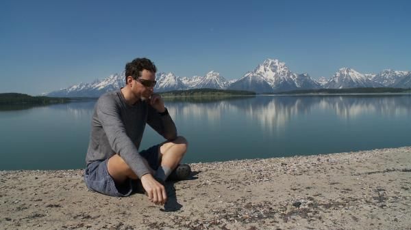 Mike Dion makes a difficult phone call to his family during the Tour Divide