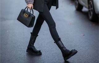 Image of woman wearing bottega veneta lug boots