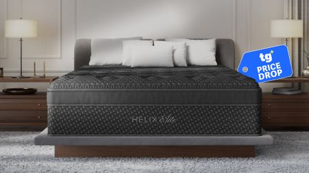 The Helix Midnight Elite Mattress on a bed frame in a bedroom, a Tom's GUide price drop deals badge in the top right corner