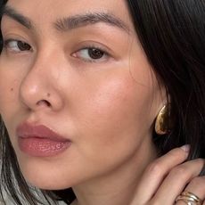 Creator @mimixn taking a selfie with glowing skin