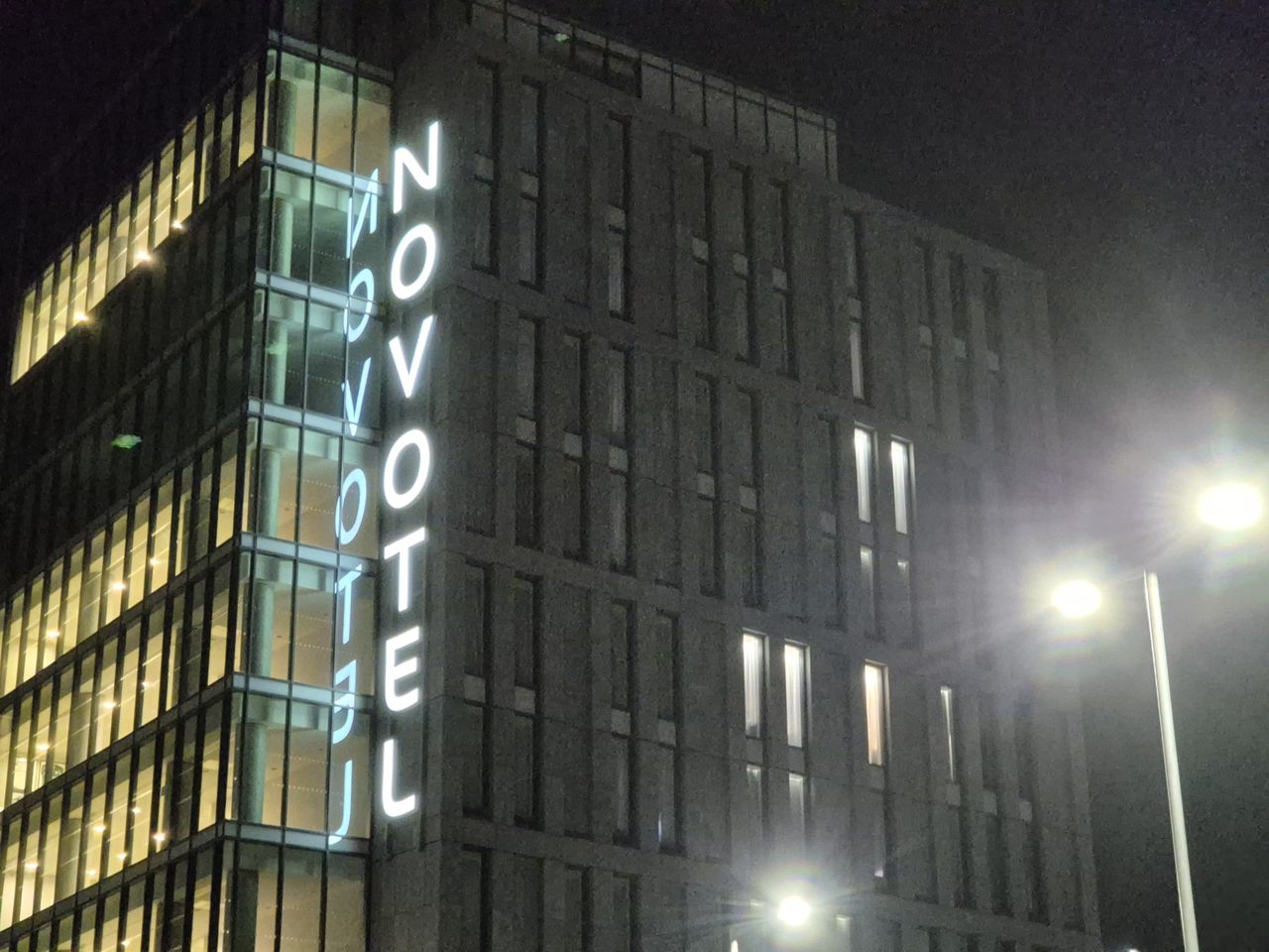 Close up of a hotel building at night