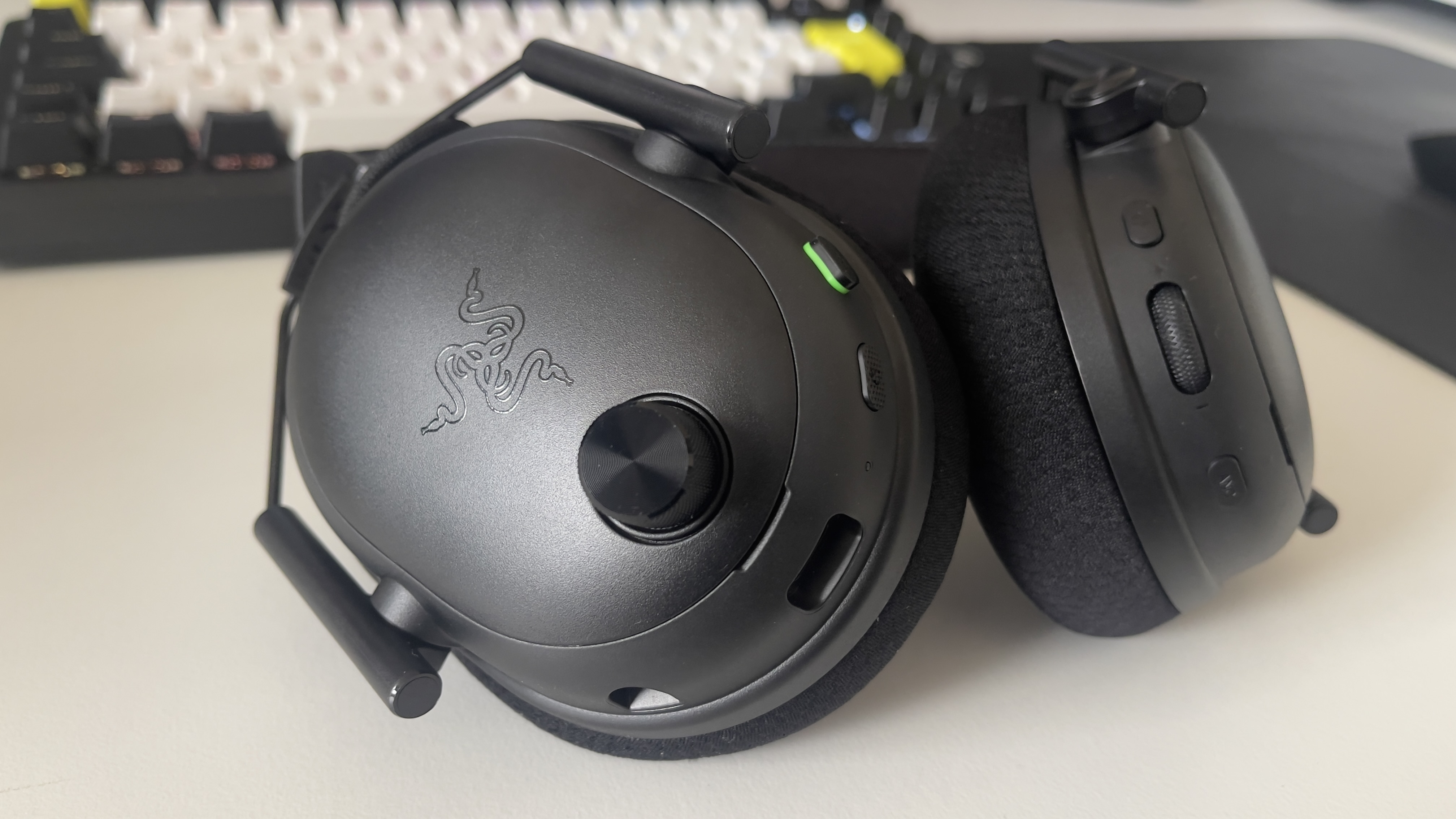 The Razer BlackShark V3 Pro headset on a desk
