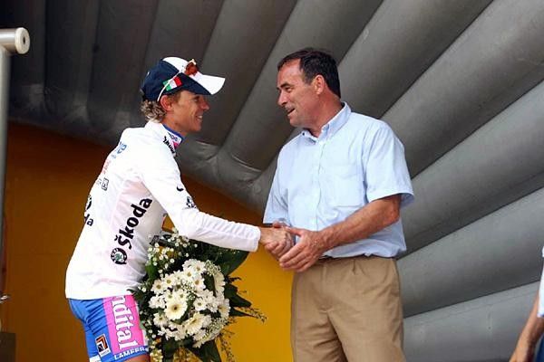 Damiano Cunego (Lampre) is congratulated by Bernard Hinault