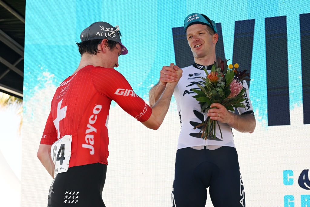 GEELONG AUSTRALIA FEBRUARY 02 LR The race winner Mauro Schmid of Switzerland and Team Jayco AlUla and the second classified Aaron Murray Gate of New Zealand and XDS Astana Team congratulate each other at podium during the 9th Cadel Evans Great Ocean Road Race 2025 Mens Elite a 1838km one day race from Geelong to Geelong UCIWT on February 02 2025 in Geelong Australia Photo by Dario BelingheriGetty Images