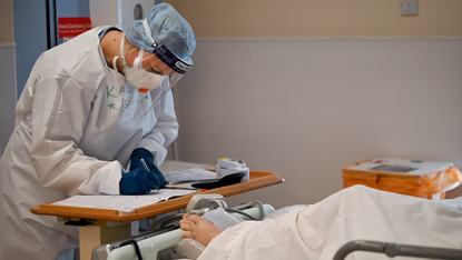 Hospital staff and patient