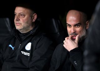 Pep Guardiola, right, shocked many with his team selection