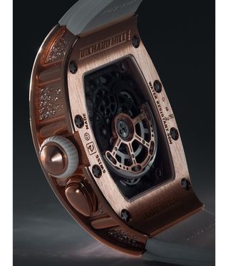 Red gold back of a richard mille watcho