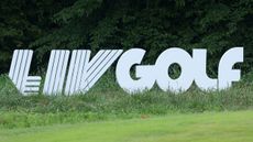 A LIV Golf logo sign seen during a tournament