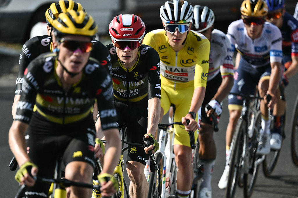 (From L) Team Visma - Lease a bike team&#039;s US rider Sepp Kuss, Team Visma - Lease a bike team&#039;s Danish rider Jonas Vingegaard, UAE Team Emirates - XRG team&#039;s Slovenian rider Tadej Pogacar and Soudal Quick-Step team&#039;s Belgian rider Remco Evenepoel during the 10th stage of the 112th edition of the Tour de France cycling race, 165.3 km between Ennezat and Le Mont-Dore Puy de Sancy, in central France, on July 14, 2025. (Photo by Marco BERTORELLO / AFP)