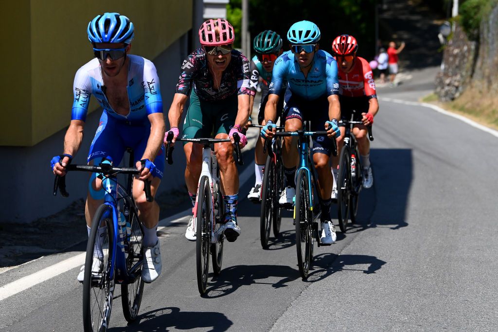 TURIN ITALY MAY 21 LR Simon Yates of United Kingdom and Team BikeExchange Jayco and Magnus Cort Nielsen of Denmark and Team EF Education Easypost compete during the 105th Giro dItalia 2022 Stage 14 a 147km stage from Santena to Torino Giro WorldTour on May 21 2022 in Turin Italy Photo by Tim de WaeleGetty Images