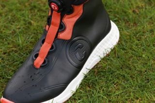 A close up of water on the surface of the Duca Del Cosma Bologna golf boot