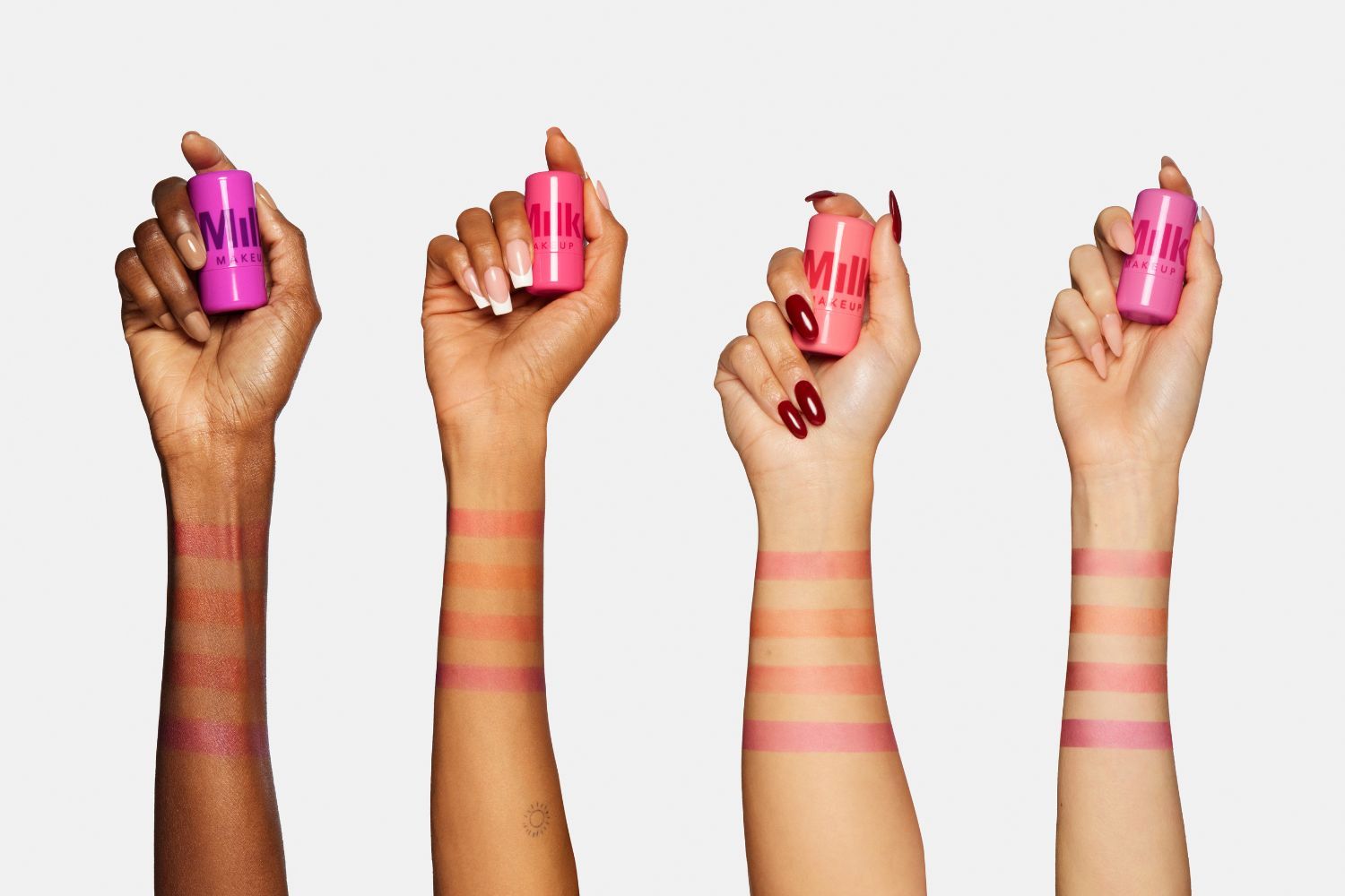 Milk Makeup Jelly Tint swatched on various skin tones
