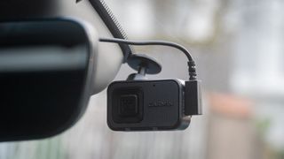 Garmin Mini 3 dashcam mounted on a car windshield