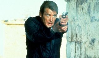 Roger Moore aims his gun and shoots in For Your Eyes Only.