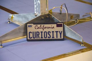 This mock license plate won't fly with Curiosity to Mars but represents that NASA's Jet Propulsion Laboratory in Pasadena, Calif., manages the Mars Science Laboratory mission.