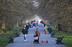 people exercising in a park in London