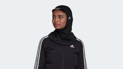 Image shows cyclist wearing a hijab