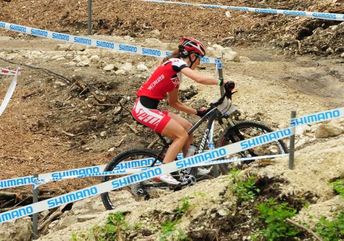 Lea Davison (Specialized) muscling her way up a steep section
