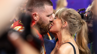 Travis Kelce #87 of the Kansas City Chiefs and Taylor Swift kiss following the NFL Super Bowl 58 football game between the San Francisco 49ers and the Kansas City Chiefs at Allegiant Stadium