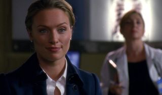 Law and Order: SVU ADA Greylek smiling in a medical office