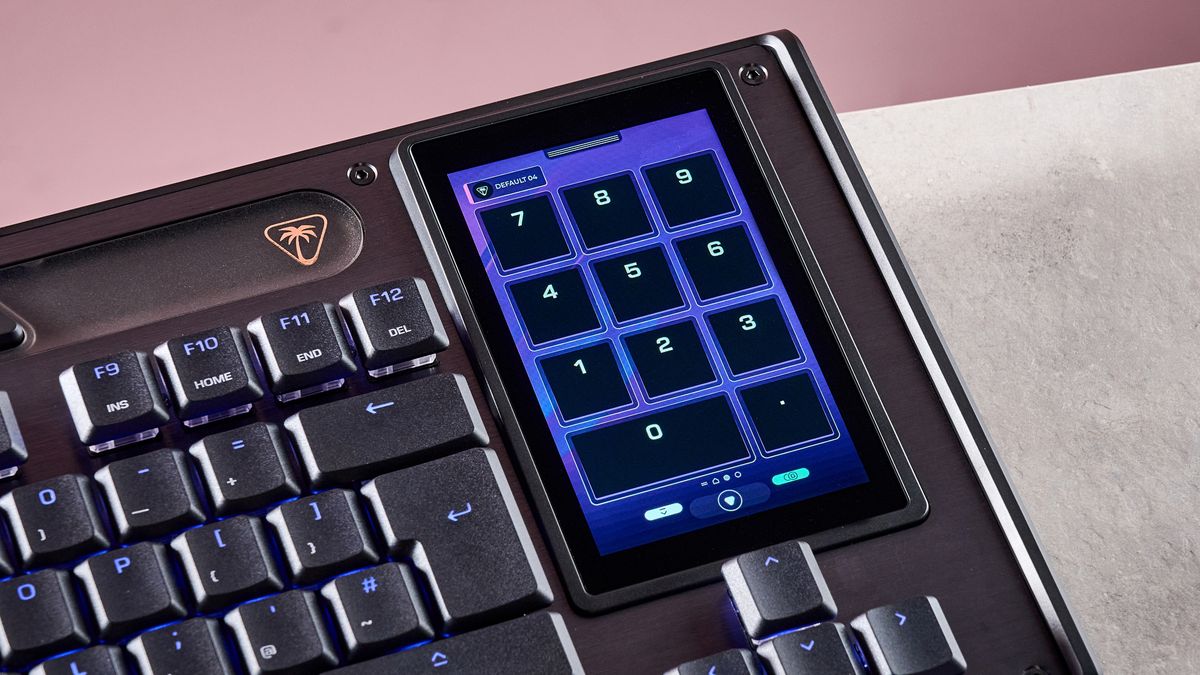 A closeup of the Turtle Beach Command Series KB7's built-in touchscreen featuring numbers on the screen.
