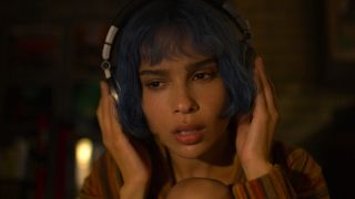 Zoe Kravitz listening to audio in Kimi