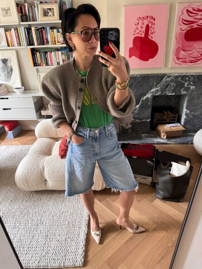 @lisaingmarinelli wearing a cardigan and jorts