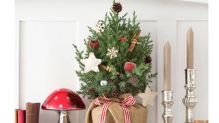 Tabletop Christmas tree with pinecone Christmas tree topper idea