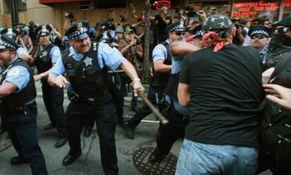 Police clash with demonstrators protesting the NATO Summit on May 20 in Chicago.