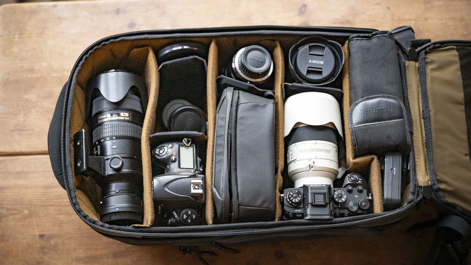 The main internal compartment filled with camera gear of the Gomatic McKinnon Camera Pack 35L