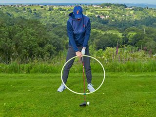 PGA Pro Ged Walters demonstrating the driver swing arc using a hoop