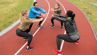 Runners squatting