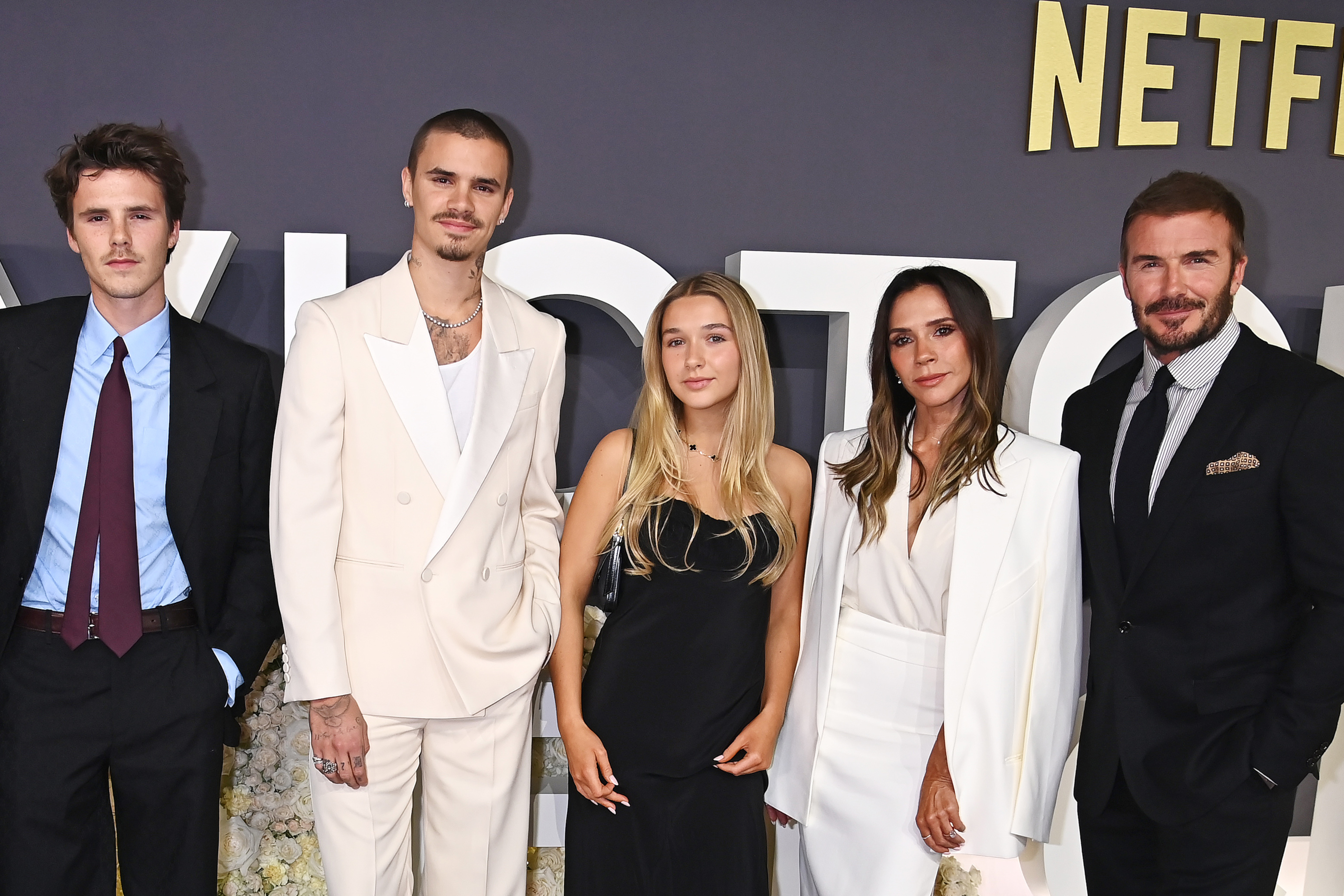 Victoria and David Beckham with children Romeo, Cruz and Harper
