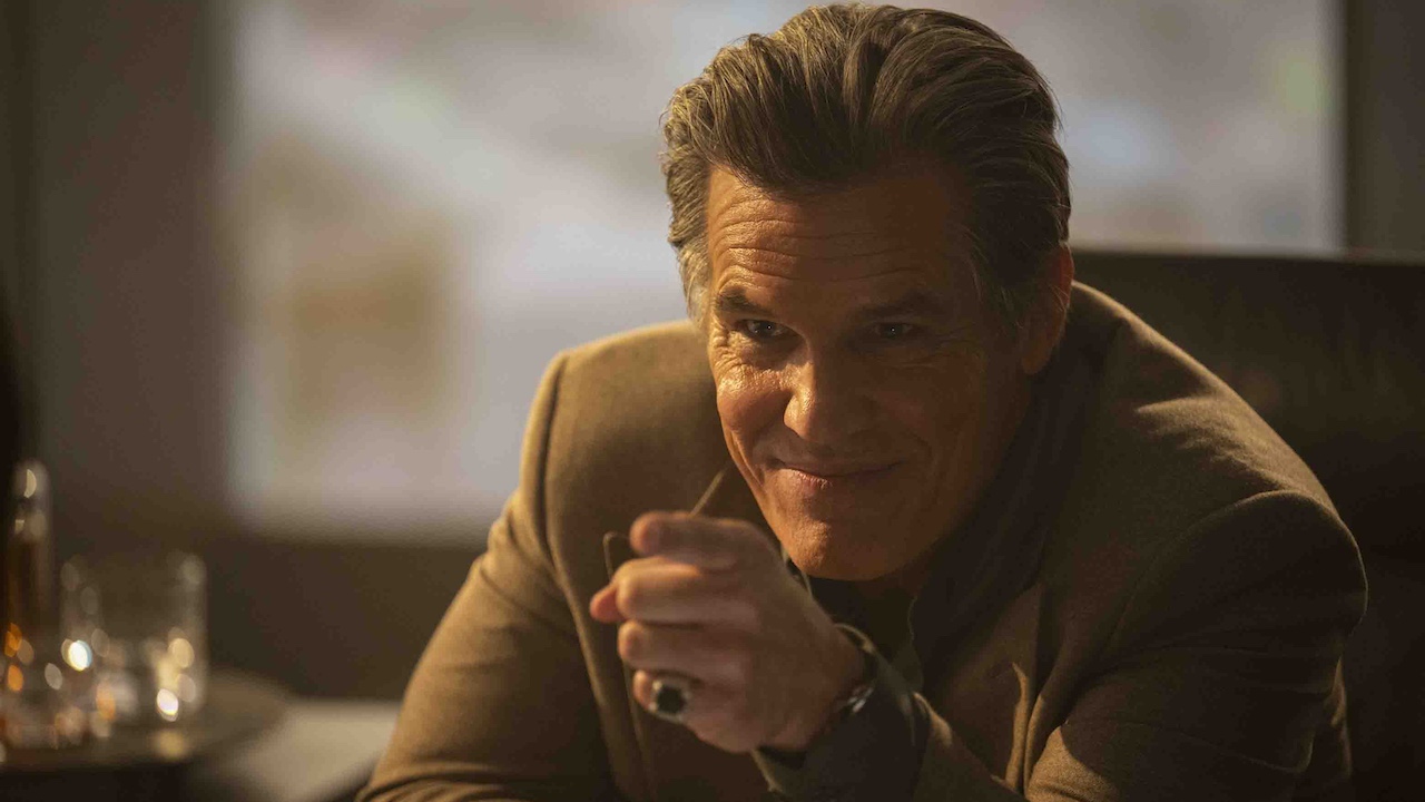 Josh Brolin pointing while smiling in The Running Man