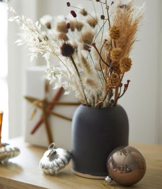natural beauty with tonal baubles and wooden table