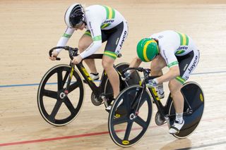 Steph Morton, top, and Anna Meares battle in the sprint quarter finals with Meares going through to the semis