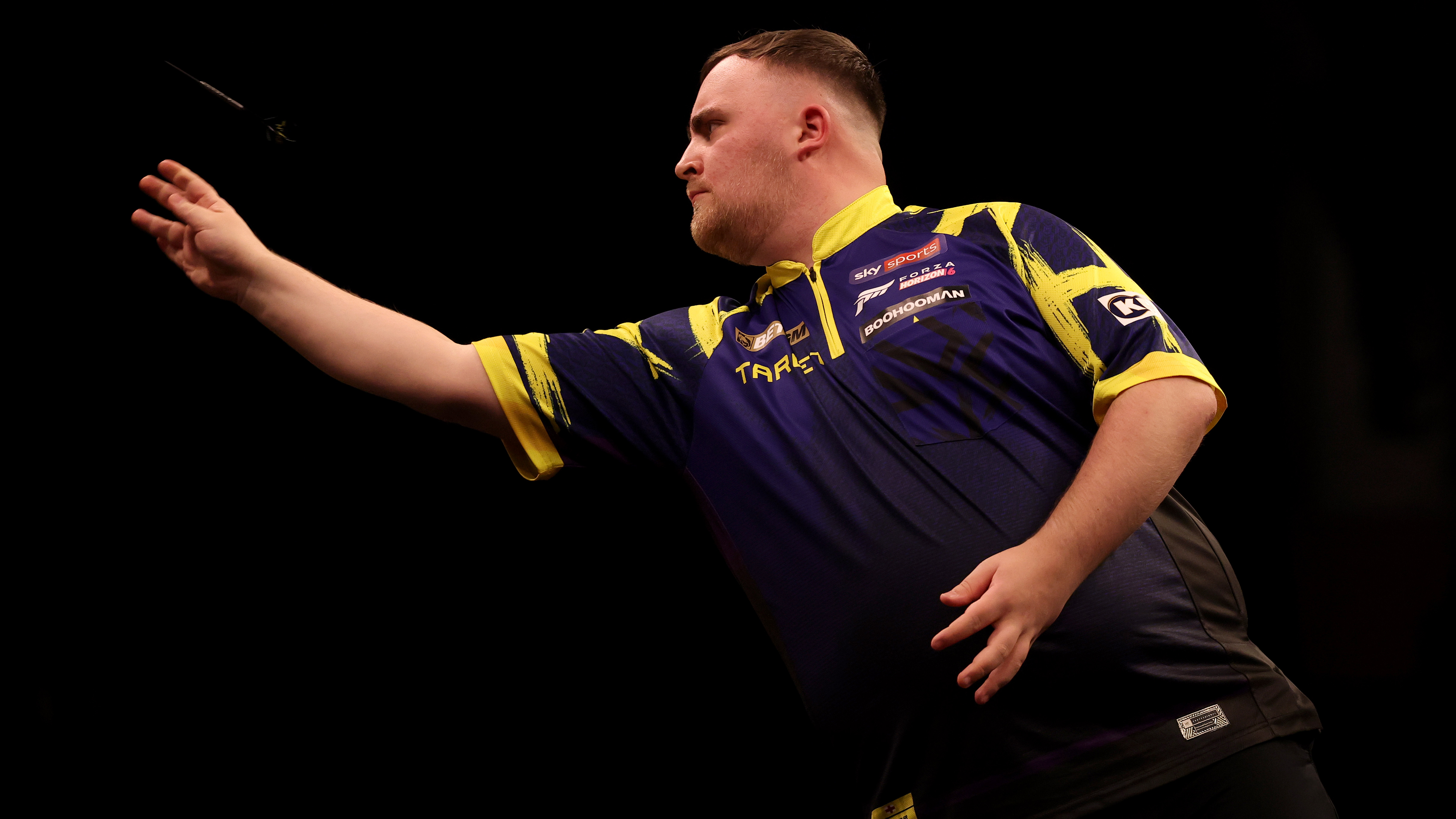 Luke Littler in action during his Semi-Final against Luke Humphries at Utilita Arena Sheffield