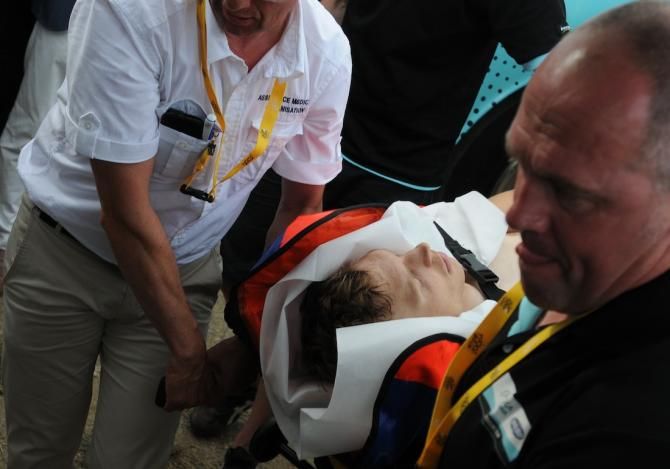 Martin being placed in the ambulance