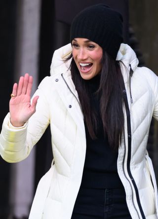 Meghan Markle in a white coat