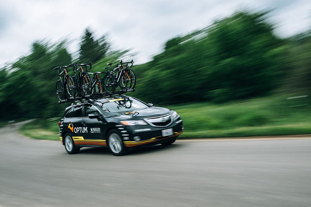 Optum Pro Cycling caravan car