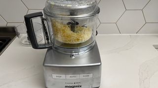 The Magimix 4200XL being used to grate cheese