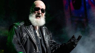 Rob Halford performing onstage with Judas Priest in 2025